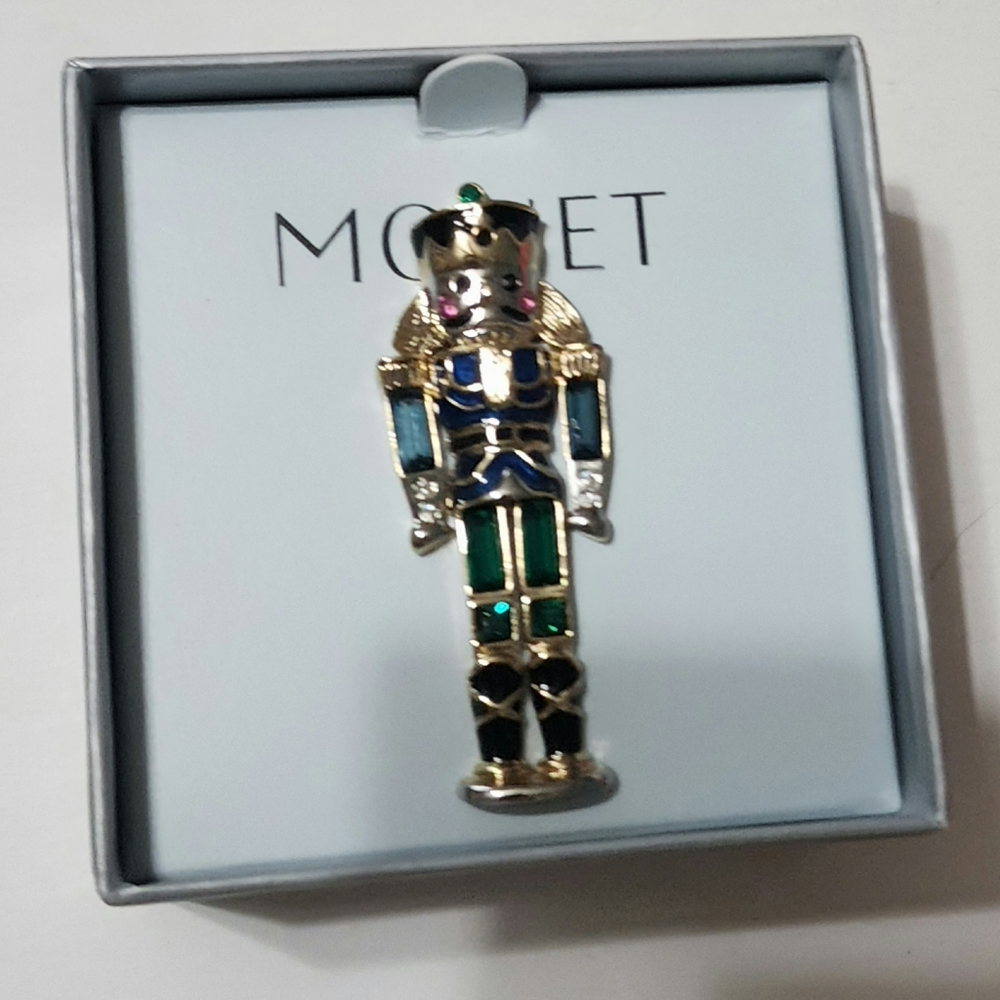 Nut-cracker brooch